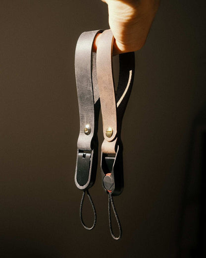 Bundle of two quick release vintage leather keychains in brown with metal rivets