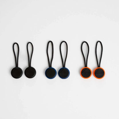 Quick Release Clips in black, blue, and orange for camera straps compatible with DSLR and analog cameras